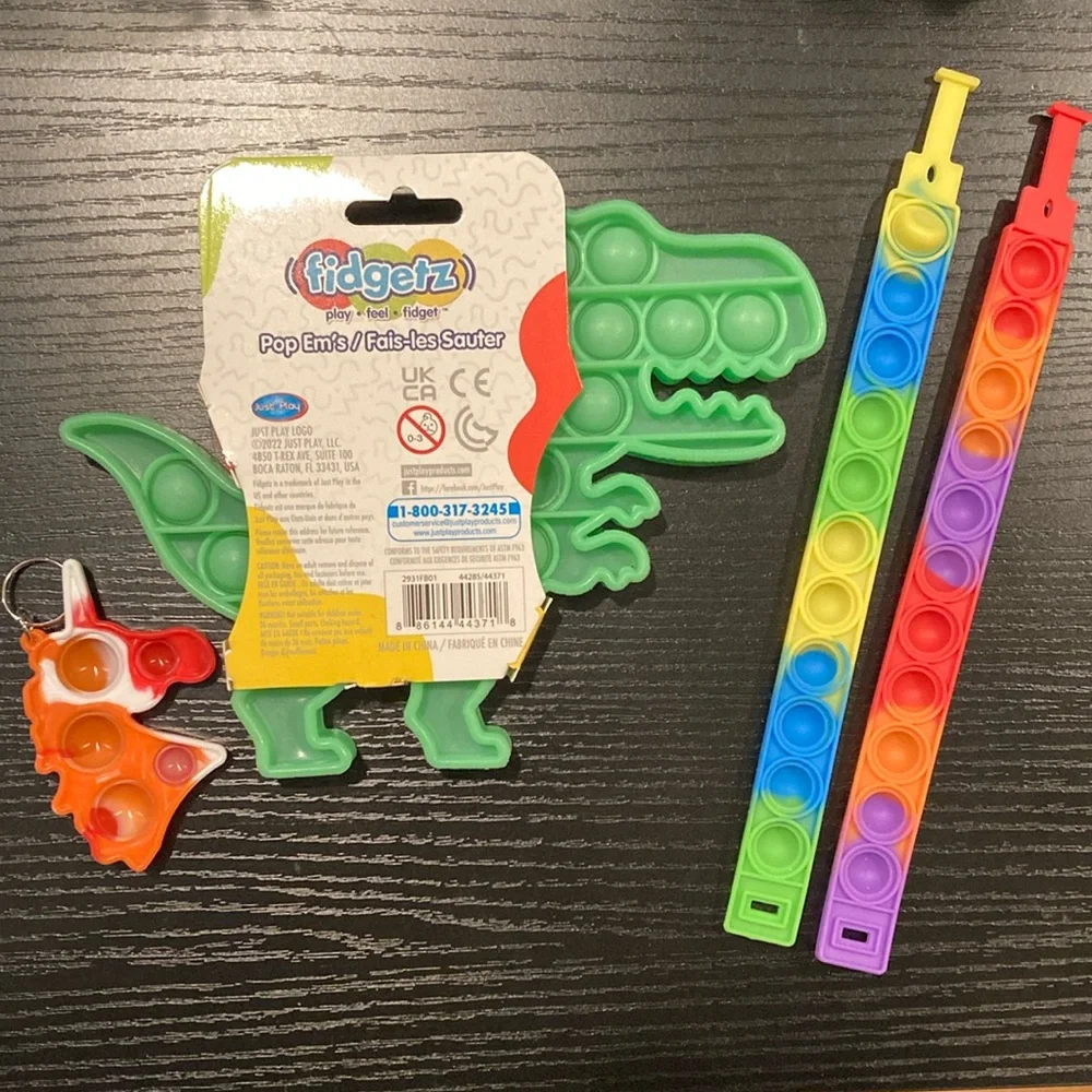 Pop-Its Set of 4 includes Glow In Dark Dinosaur New Kids Sensory Autism Fidget